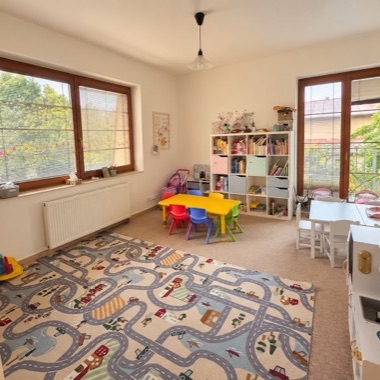 The big playroom in Roztoky with a road-map rug