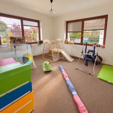 Movement room – trampoline, climbing frame with slide and balance path